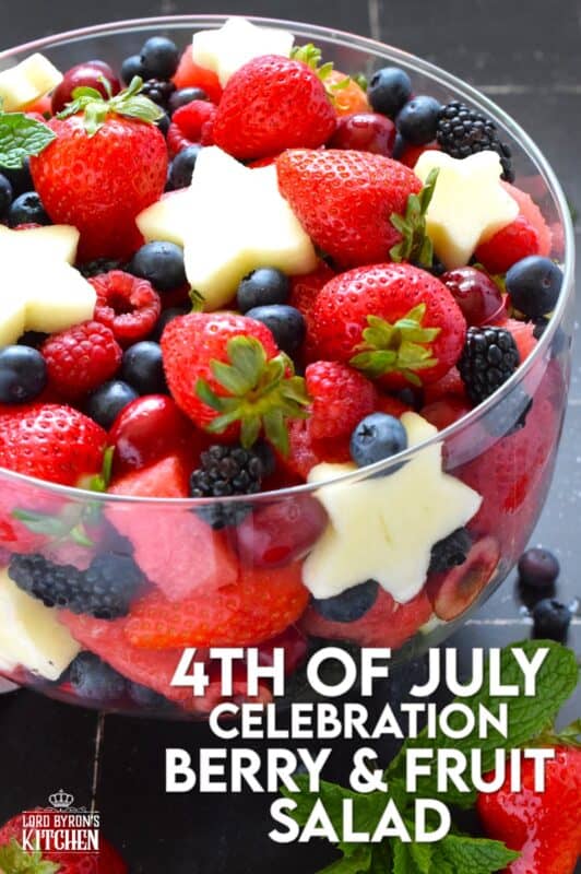 A perfectly gorgeous and healthy dessert option for your 4th of July party, this Celebration Berry and Fruit Salad is prepared with watermelon, strawberries, cherries, raspberries, blueberries, and apples cut into celebratory star shapes! Drizzled with a quick and easy glaze, this is a beautiful dessert everyone will want a taste of! #4thofjuly #fruit #berries #salad #redwhiteandblue