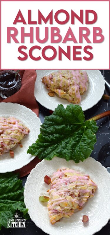 Puckeringly tart rhubarb is mellowed in these slightly sweet Almond Rhubarb Scones. Prepared with a splash of vanilla extract and crunchy sliced almonds, these are an absolute delight. Topped with a sweet pink glaze made with grenadine, they're just beautiful! #scones #rhubarb #grenadine #glaze