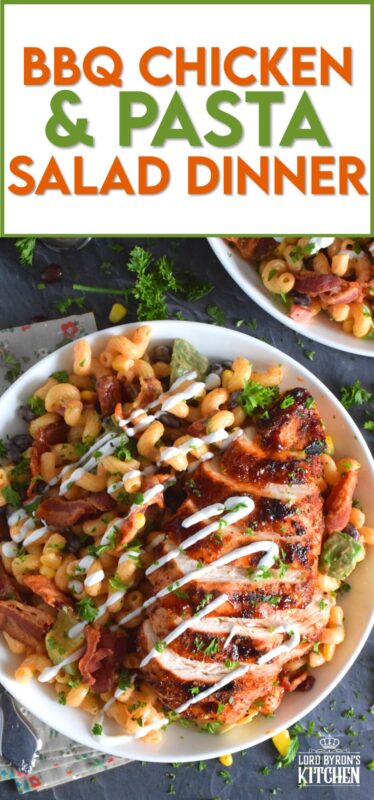 Spice-seasoned chicken breasts are grilled to perfection and then brushed with BBQ sauce and served with a delicious pasta salad prepared with bacon, avocado, corn, black beans, green onions, and roasted red peppers.  This pasta salad dinner is a hearty meal great for any backyard family picnic! #bbq #chicken #pasta #salad #dinner