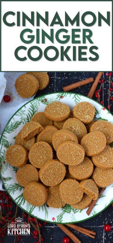 With a slightly crispy outer edge and a chewy center, Cinnamon Ginger Cookies are topped with a sprinkling of caramelly turbinado sugar. These cookies are warming to the taste because of the mild heat produced by the cinnamon and ginger. Serve these with hot tea or coffee for a delightful little treat! #molasses #cinnamon #ginger #cookies