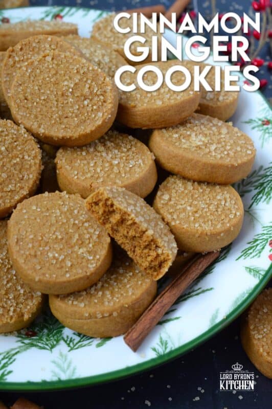 With a slightly crispy outer edge and a chewy center, Cinnamon Ginger Cookies are topped with a sprinkling of caramelly turbinado sugar. These cookies are warming to the taste because of the mild heat produced by the cinnamon and ginger. Serve these with hot tea or coffee for a delightful little treat! #molasses #cinnamon #ginger #cookies