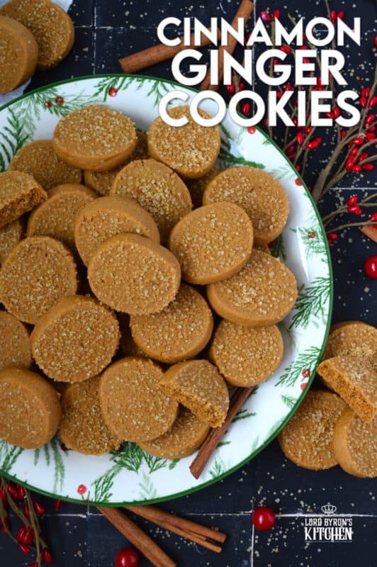 With a slightly crispy outer edge and a chewy center, Cinnamon Ginger Cookies are topped with a sprinkling of caramelly turbinado sugar. These cookies are warming to the taste because of the mild heat produced by the cinnamon and ginger. Serve these with hot tea or coffee for a delightful little treat! #molasses #cinnamon #ginger #cookies