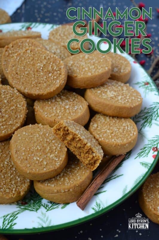 With a slightly crispy outer edge and a chewy center, Cinnamon Ginger Cookies are topped with a sprinkling of caramelly turbinado sugar. These cookies are warming to the taste because of the mild heat produced by the cinnamon and ginger. Serve these with hot tea or coffee for a delightful little treat! #molasses #cinnamon #ginger #cookies