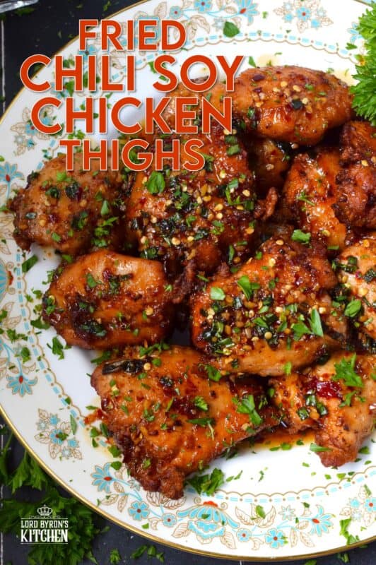 Moist and tender, Fried Chili Soy Chicken Thighs are marinated and pan-fried until crispy and drizzled with a homemade chili sauce easily prepared with brown sugar, chilies, vinegar, and sesame oil. #chicken #asian #fried #spicy #thighs