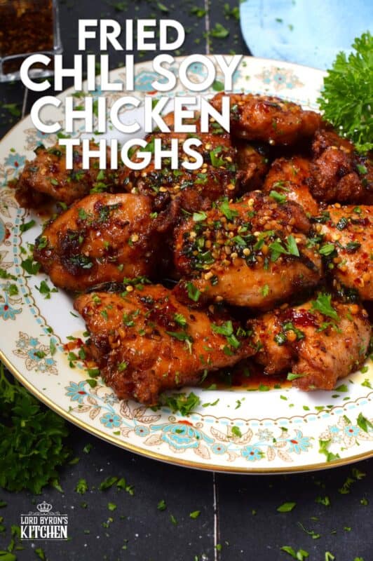 Moist and tender, Fried Chili Soy Chicken Thighs are marinated and pan-fried until crispy and drizzled with a homemade chili sauce easily prepared with brown sugar, chilies, vinegar, and sesame oil. #chicken #asian #fried #spicy #thighs