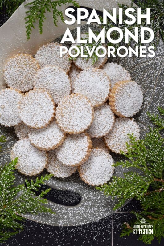 If it's a bang for your buck you want, these Spanish Almond Polvorones are just the thing! And it doesn't get any simpler than butter, sugar, all-purpose flour, almond flour, and cinnamon. Don't bother with fancy decoration! Dust these cookies with confectioner's sugar only because perfection doesn't need to be prettied! #polvorones #spanish #cookies #christmas