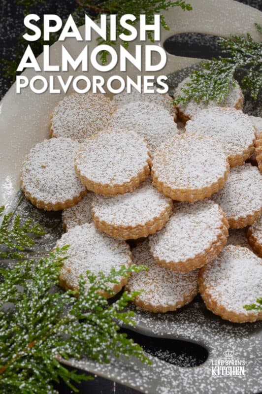 If it's a bang for your buck you want, these Spanish Almond Polvorones are just the thing! And it doesn't get any simpler than butter, sugar, all-purpose flour, almond flour, and cinnamon. Don't bother with fancy decoration! Dust these cookies with confectioner's sugar only because perfection doesn't need to be prettied! #polvorones #spanish #cookies #christmas