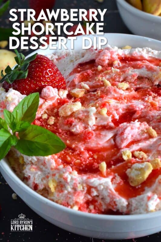 Strawberry Shortcake Dessert Dip is creamy, thick, and does not deflate like whipped cream because it's made with mascarpone! It's sweet, slightly tart, and made with strawberry shortcake crumbs! #strawberry #shortcake #crumbs #dessert #dip #mascarpone