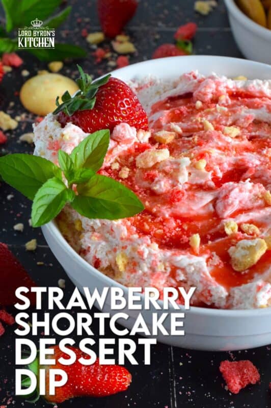 Strawberry Shortcake Dessert Dip is creamy, thick, and does not deflate like whipped cream because it's made with mascarpone! It's sweet, slightly tart, and made with strawberry shortcake crumbs! #strawberry #shortcake #crumbs #dessert #dip #mascarpone