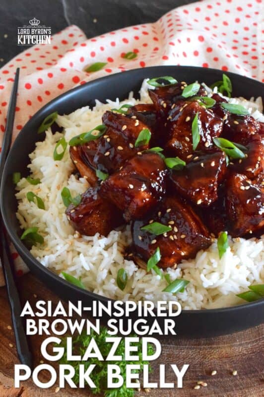 This sweet and sticky Glazed Pork Belly is cooked in two stages. First, the meat is boiled with seasonings and then fried before being cooked in a brown sugar, soy sauce, and rice wine reduction. Served with steamed rice, this is a meal that would please the toughest critic! #porkbelly #pork #belly