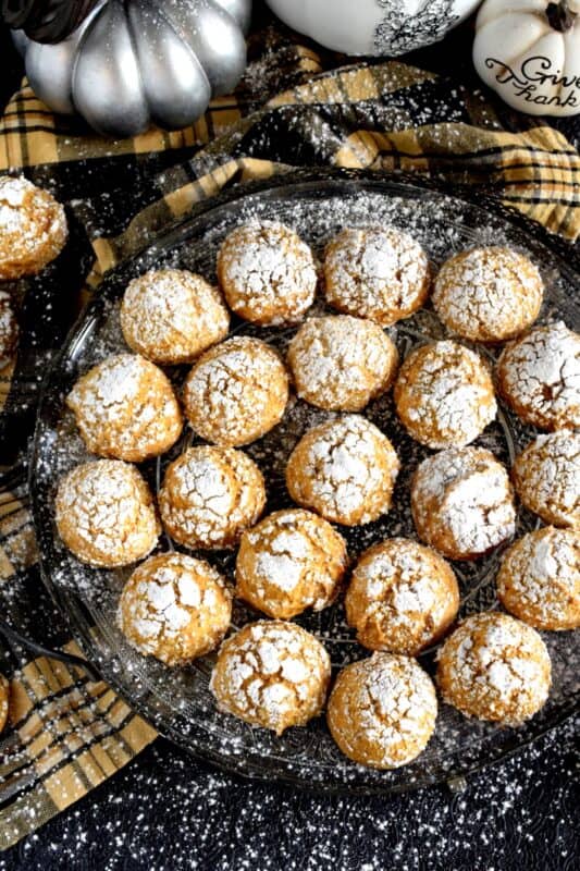 If you're looking for a soft, chewy, moist, pillow-y, pumpkin spiced cookie, then you've come to the right place! Pumpkin Crinkle Cookies are all of those things and more - like, delicious and addicting! #pumpkin #crinkle #cookies #pumpkinspice #spice