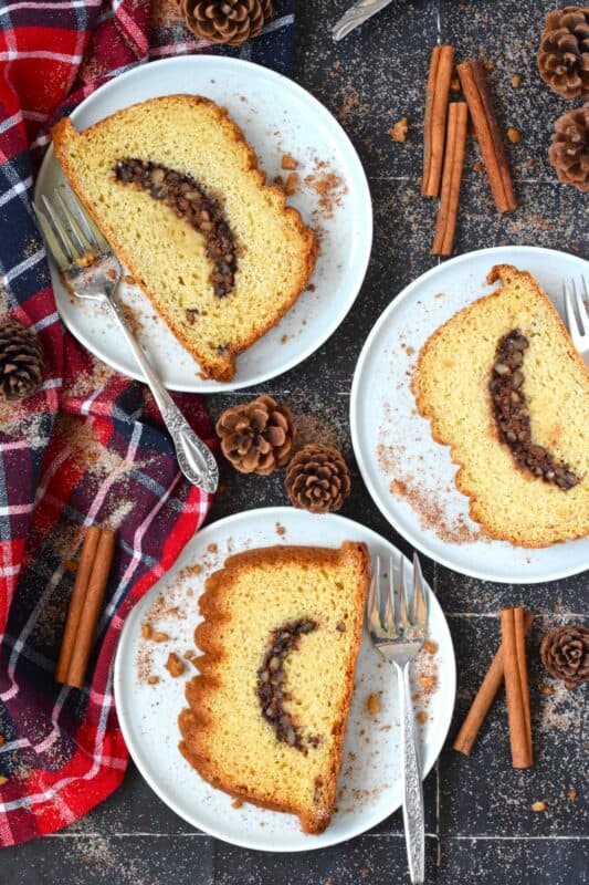 A delicious and moist loaf with a cinnamon walnut crumb center is simply delectable! No frosting or fancy decorating skills are needed; serve this Eggnog Walnut Cinnamon Bread with vanilla ice cream for a great dessert, or enjoy a slice just as it is with a cup of hot tea as an afternoon treat. #loaf #bread #cinnamon #walnut #christmas