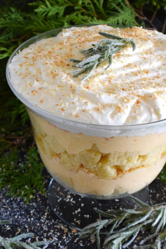For all of my fellow coconut aficionados, this one is for you! Prepared with toasted coconut, coconut pound cake, and coconut cream filling, you're sure to get your coconut fix with a big bite of this Toasted Coconut Trifle! One of the easiest desserts to prepare, but with gorgeous presentation results! #trifle #toasted #coconut #cream #pie 