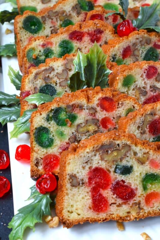 Packed full of red and green candied cherries and whole toasted walnuts, this Walnut and Candied Cherry Loaf is loaded with familiar and cozy holiday flavour! This moist and delicious fuss-free loaf does not require or need any glaze or frosting; serve it just as is, because it is quite perfect! #candied #cherries #walnut #loaf #bread