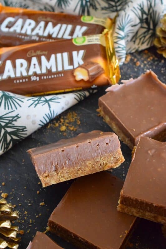 Inspired by Australia's Anzac bars, these Oatmeal Caramilk Bars were developed using common North American ingredients that are more readily available.  It's hard to believe these delicious cookies are prepared with only four ingredients! And, they're no-bake too which is always a bonus! #caramilk #cadbury #anzac #bars #squares #nobake