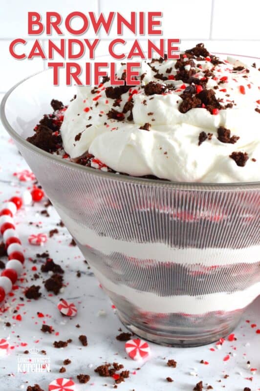 Prepared with two-bite brownies, decadent whipped cream, and crushed candy canes, this Brownie Candy Cane Trifle has all the flavours one craves at Christmastime! Take the easy route and purchase brownies at the grocer. Christmas no-bake desserts should be stress-free and relaxing after all! #peppermint #trifle #brownies #candycane