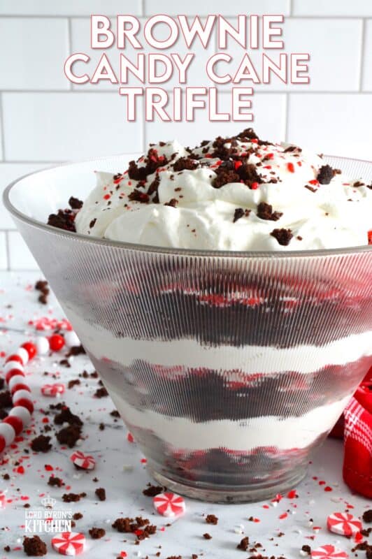 Prepared with two-bite brownies, decadent whipped cream, and crushed candy canes, this Brownie Candy Cane Trifle has all the flavours one craves at Christmastime! Take the easy route and purchase brownies at the grocer. Christmas no-bake desserts should be stress-free and relaxing after all! #peppermint #trifle #brownies #candycane
