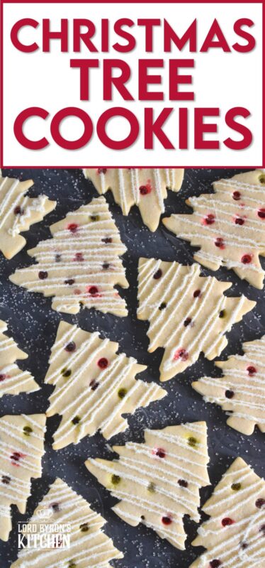 Dig out your tree-shaped cookie cutter and whip up a batch of these Christmas Tree Cookies! The ornaments are easy to make with crushed candy and they're baked right into the cookie dough. It's like adding decoration and flavour at the same time! #christmas #cookies #tree