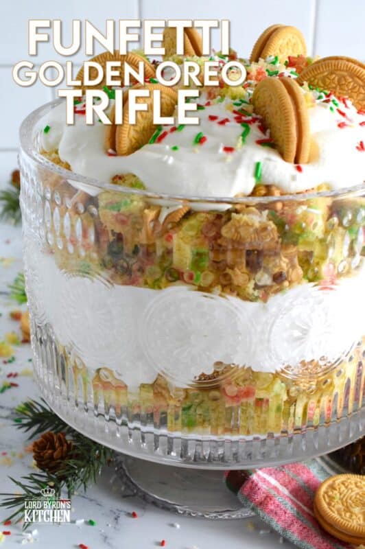 Starting with a homemade vanilla funfetti cake, this Funfetti Golden Oreo Trifle is layered with light and fluffy whipped cream, festive sprinkles, and crushed Oreo cookies. Put a smile on everyone's face with this deliciously gorgeous and easy Christmas dessert! #trifle #oreo #funfetti #sprinkles