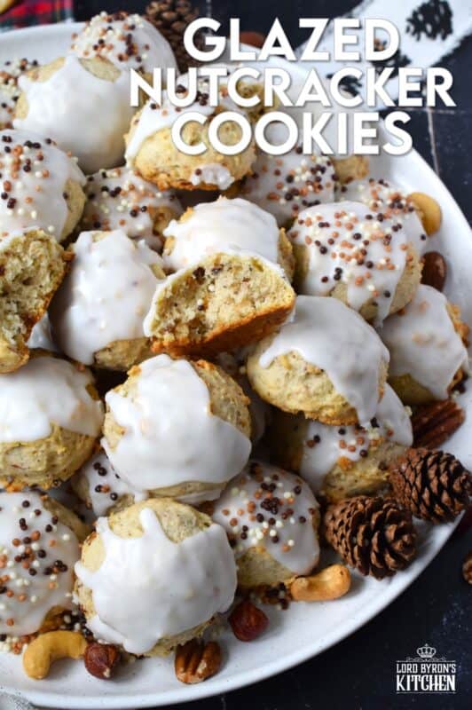Alert the Mouse King because these Glazed Nutcracker Cookies are prepared with a copious amount of chopped nuts! Using salted nuts balances out the sweetness of the delicate, soft cookie and provides ample crunch and texture. Make extra and share them with your friends - just don't snack on them at the ballet! #nutcracker #christmas #cookies #glazed #nuts #nutty