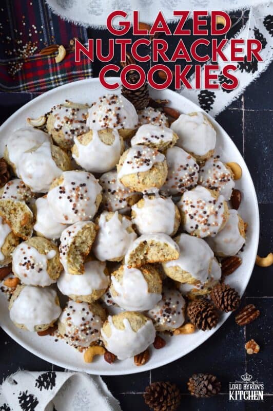 Alert the Mouse King because these Glazed Nutcracker Cookies are prepared with a copious amount of chopped nuts! Using salted nuts balances out the sweetness of the delicate, soft cookie and provides ample crunch and texture. Make extra and share them with your friends - just don't snack on them at the ballet! #nutcracker #christmas #cookies #glazed #nuts #nutty