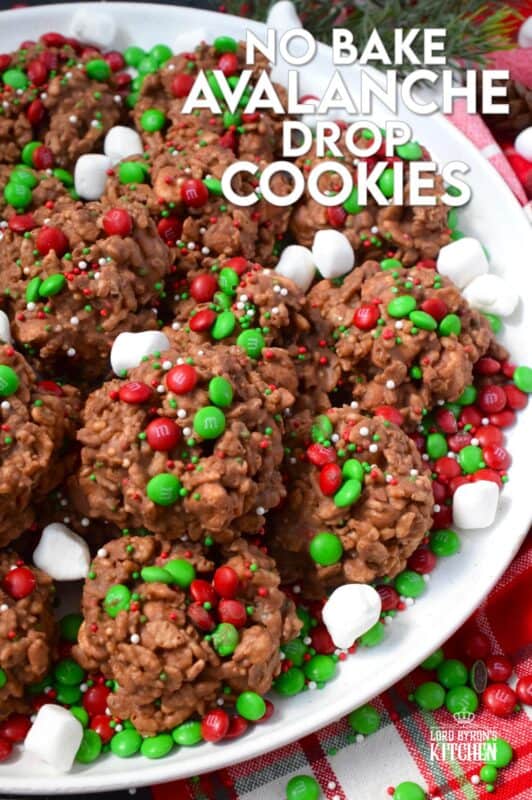 Time is short at Christmas with so many things to do, so incorporate some no-bake cookie options into your holiday baking to make your life easier. No Bake Avalanche Drop Cookies are prepared with chocolate, peanut butter, marshmallows, cereal, and candy. They are quick, easy, budget-friendly, and of course, delicious! #nobake #peanutbutter #drop #cookies #mm #christmas