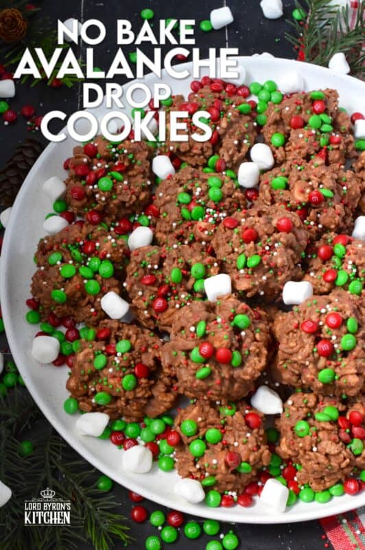 Time is short at Christmas with so many things to do, so incorporate some no-bake cookie options into your holiday baking to make your life easier. No Bake Avalanche Drop Cookies are prepared with chocolate, peanut butter, marshmallows, cereal, and candy. They are quick, easy, budget-friendly, and of course, delicious! #nobake #peanutbutter #drop #cookies #mm #christmas
