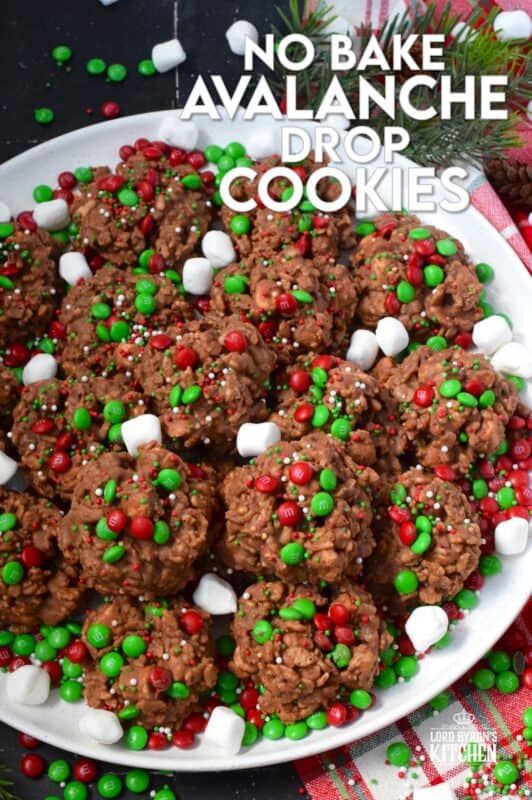 Time is short at Christmas with so many things to do, so incorporate some no-bake cookie options into your holiday baking to make your life easier. No Bake Avalanche Drop Cookies are prepared with chocolate, peanut butter, marshmallows, cereal, and candy. They are quick, easy, budget-friendly, and of course, delicious! #nobake #peanutbutter #drop #cookies #mm #christmas
