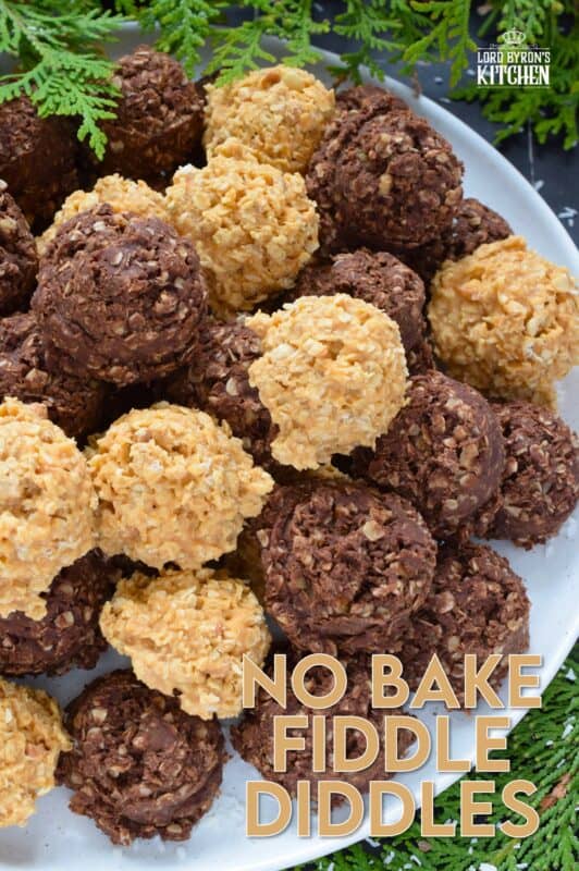 Fashioned much like a coconut macaroon, these No Bake Fiddle Diddles are all gussied up for the holidays! This recipe is quite easy; everything goes into one saucepan to combine, and then just drop spoonfuls of the mixture onto a lined baking sheet. Decorate with sprinkles, and candies, or leave them plain! Make both flavours because these are deliciously addictive! #nobake #fiddle #diddles #chocolate #peanutbutter #christmas