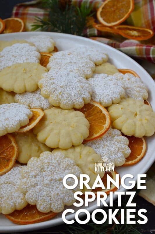 Slightly sweet and buttery with a burst of fresh citrus flavour, these Orange Spritz Cookies melt in your mouth! Every holiday cookie exchange or plate must have a spritz cookie, so I encourage you to try this classic recipe with an orange zest twist! #spritz #cookies #orange #zest