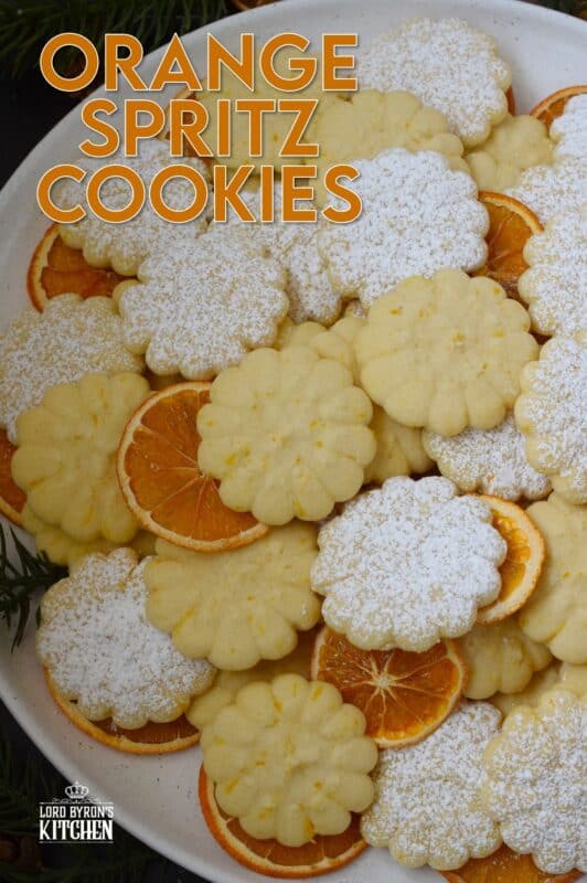 Slightly sweet and buttery with a burst of fresh citrus flavour, these Orange Spritz Cookies melt in your mouth! Every holiday cookie exchange or plate must have a spritz cookie, so I encourage you to try this classic recipe with an orange zest twist! #spritz #cookies #orange #zest