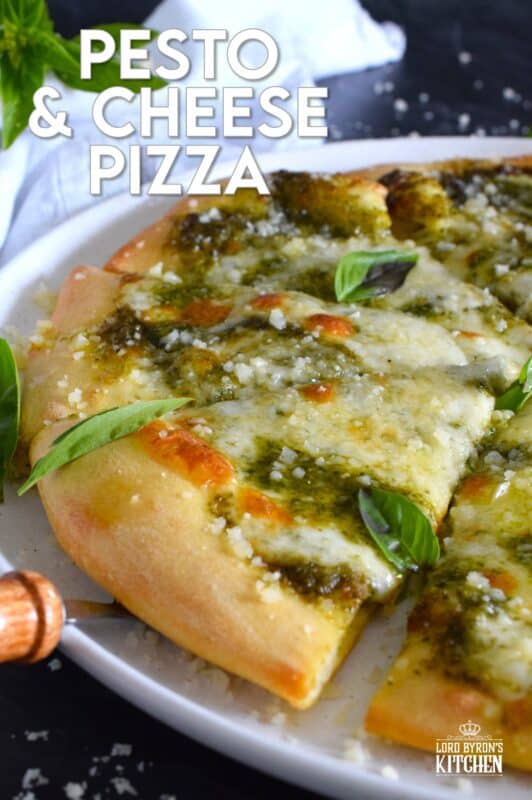 There is no steadfast rule that states pizza must be prepared with tomato sauce and the proof can be found right here in this Pesto and Cheese Pizza recipe! Start with a quick and easy homemade pesto sauce and a very simple pizza dough - you can use store-bought pesto and dough too! Either way, this pizza is bound to impress! #pizza #pesto #basil #vegetarian #cheese