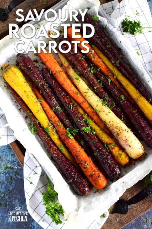 A wonderful, earthy side dish, Savoury Roasted Carrots combines dried pantry herbs with olive oil to make a home-style, rustic - and colourful! - side dish. Surprisingly simple, yet extremely delicious, this is one of my most popular holiday recipes! #carrots #roasted #heirloom