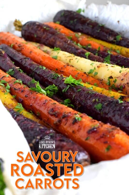 A wonderful, earthy side dish, Savoury Roasted Carrots combines dried pantry herbs with olive oil to make a home-style, rustic - and colourful! - side dish. Surprisingly simple, yet extremely delicious, this is one of my most popular holiday recipes! #carrots #roasted #heirloom