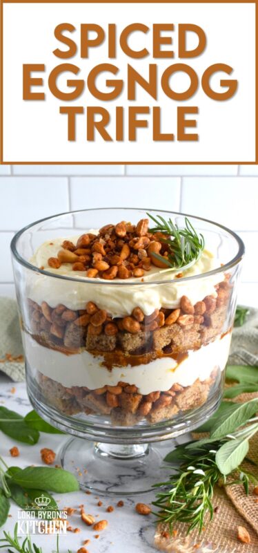 Starting with a homemade eggnog-infused, holiday rum cake, this Spiced Eggnog Trifle is layered with an eggnog cream cheese rum filling and candied mixed nuts.  Drizzled with a thick, sweet caramel sauce, this trifle is sure to be a hit!  Optionally, this recipe easily converts to a rum-free version too! #trifle #spiced #eggnog #cake #caramel #nuts