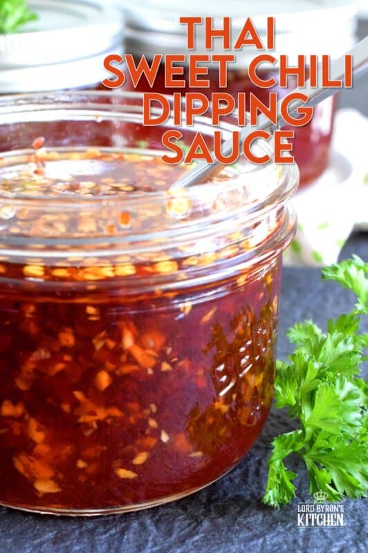You'll find a thousand ways to use this Thai Sweet Chili Dipping Sauce! It's a little spicy, a little sweet, and a little acidic, which makes a great dip for spring rolls! Spoon some over fried rice or use it as a marinade for chicken or pork. These jars make great gifts too! #dippingsauce #chilisauce #sweet #spicy #thai #dip