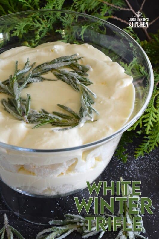 Everyone dreams of a white Christmas, or at least I do! If mother nature fails to deliver, one can always find comfort in a delicious, light, and fluffy dessert like this White Winter Trifle! Layers of angel food cake and homemade white chocolate whipped cream combine to make the most purely elegant treat! #trifle #winter #white #nobake #ganache #angelfood