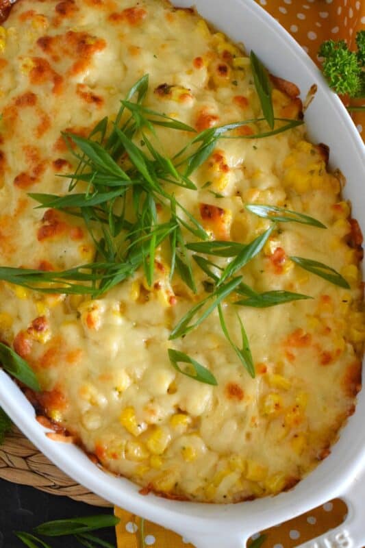 It's the last of summer fresh corn, so rather than serving the same corn on the cob, kick up the flavour and texture with this Baked Cheese Corn! Prepare the whole thing ahead of time - even a day or two in advance! - and pop it in the oven for 15 minutes just before you are ready to eat!  It's easy, it's cheesy, and it's delicious! #corn #cheesecorn #cheesy #baked #side #vegetable