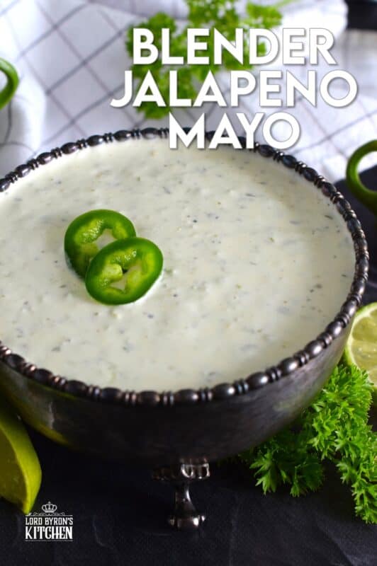 This spicy mayonnaise has just a few basic ingredients and takes about five minutes to prepare. Blender Jalapeno Mayo uses store-bought mayonnaise and combines it with fresh jalapenos, ground black pepper, parsley, garlic, onion, and lime juice. It's a spread, it's a dip, and it's a sauce! #sauce #mayo #jalapeno #spicy