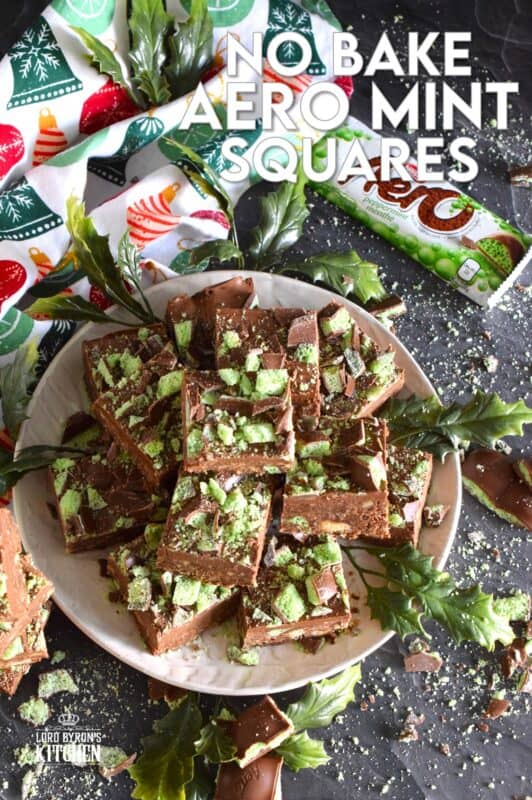 The airy, bubbly, chocolatey popular confection known as the Aero Bar, is paired with crushed cookies, cocoa powder, sweetened condensed milk, and melted milk chocolate in this No Bake Aero Mint Squares recipe. These are absolutely delicious, which makes sharing very difficult! #nestle #aero #mint #bars #nobake