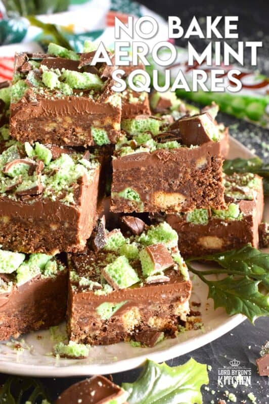 The airy, bubbly, chocolatey popular confection known as the Aero Bar, is paired with crushed cookies, cocoa powder, sweetened condensed milk, and melted milk chocolate in this No Bake Aero Mint Squares recipe. These are absolutely delicious, which makes sharing very difficult! #nestle #aero #mint #bars #nobake