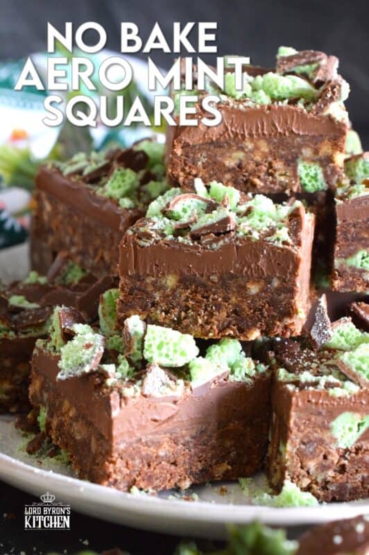The airy, bubbly, chocolatey popular confection known as the Aero Bar, is paired with crushed cookies, cocoa powder, sweetened condensed milk, and melted milk chocolate in this No Bake Aero Mint Squares recipe. These are absolutely delicious, which makes sharing very difficult! #nestle #aero #mint #bars #nobake