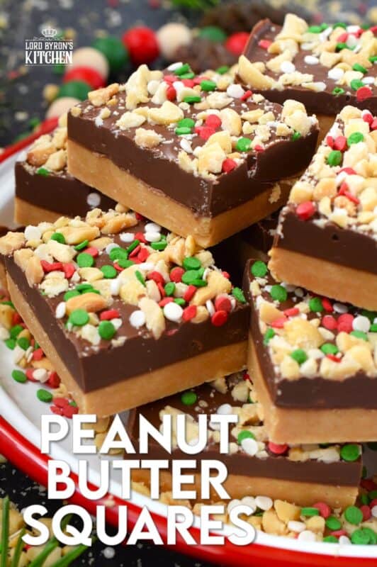 Peanut Butter Squares are a twist on the classic Peanut Butter Ball recipe. These are less time-consuming for sure but are prepared with the smooth peanut butter lover in mind. It's the same great taste but without the crunch of the rice cereal! Christmas cookie boxes are nothing without these delicious confections! #peanutbutter #christmas #squares #nobake
