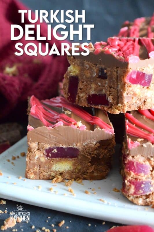 Prepared with Turkish Delight Chocolate Bars, these squares are flavoured with the familiar combination of rosewater, bergamot, and cinnamon. The chopped jellied candy is paired with condensed milk, coconut, crushed biscuits, and melted white chocolate. Turkish Delight Squares are extraordinarily delicious! #turkish #delight #rosewater #bergamot #nobake