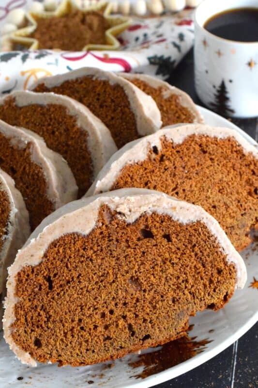The combination of sweet and sticky molasses with the warm, comforting blend of homemade chai is a match made in holiday heaven! This bread is spiced with chai and baked to perfection. Topped with a thick layer of chai-infused glaze, this bread deserves nothing less than a quiet afternoon and a cup of hot tea! #chai #bread #spiced #loaf #molasses #holiday