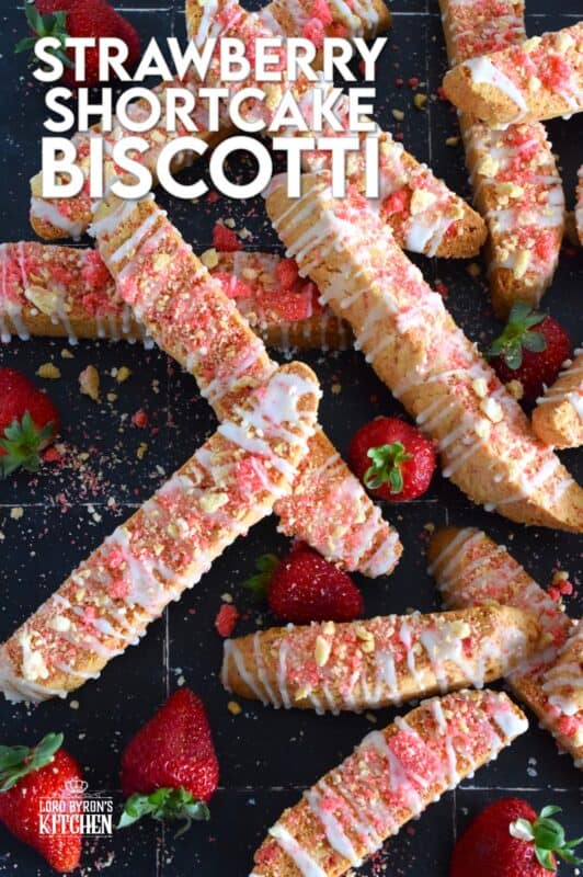 These biscotti are loaded with homemade strawberry shortcake crumbs and topped with a simple sugary glaze. Strawberry Shortcake Biscotti are light, airy, and delicious! Super easy to make, and with their cheerful inclination, no one could resist! Treat yourself to one of these with a hot tea on a lazy Sunday afternoon. #strawberry #shortcake #crumbs #cookies #biscotti #valentine