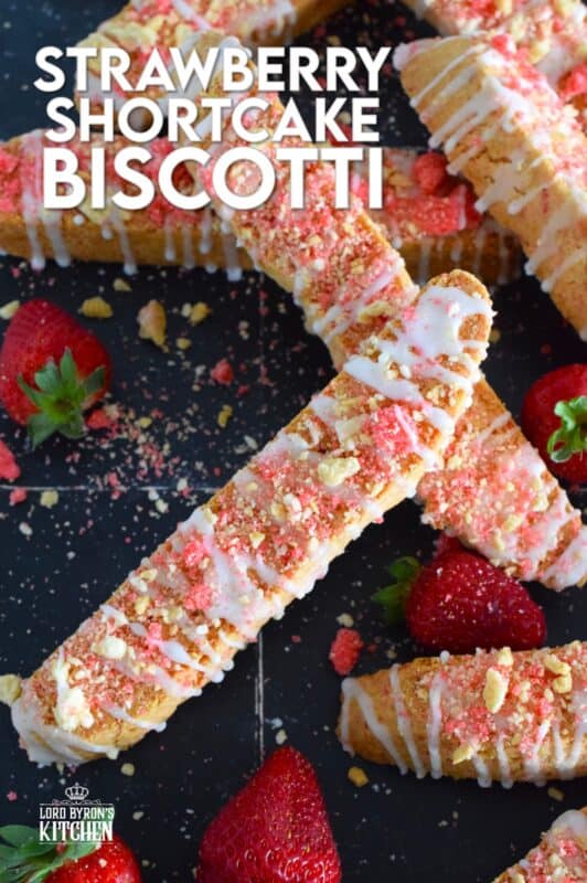 These biscotti are loaded with homemade strawberry shortcake crumbs and topped with a simple sugary glaze. Strawberry Shortcake Biscotti are light, airy, and delicious! Super easy to make, and with their cheerful inclination, no one could resist! Treat yourself to one of these with a hot tea on a lazy Sunday afternoon. #strawberry #shortcake #crumbs #cookies #biscotti #valentine