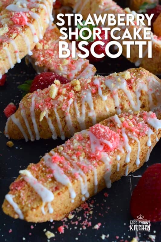These biscotti are loaded with homemade strawberry shortcake crumbs and topped with a simple sugary glaze. Strawberry Shortcake Biscotti are light, airy, and delicious! Super easy to make, and with their cheerful inclination, no one could resist! Treat yourself to one of these with a hot tea on a lazy Sunday afternoon. #strawberry #shortcake #crumbs #cookies #biscotti #valentine