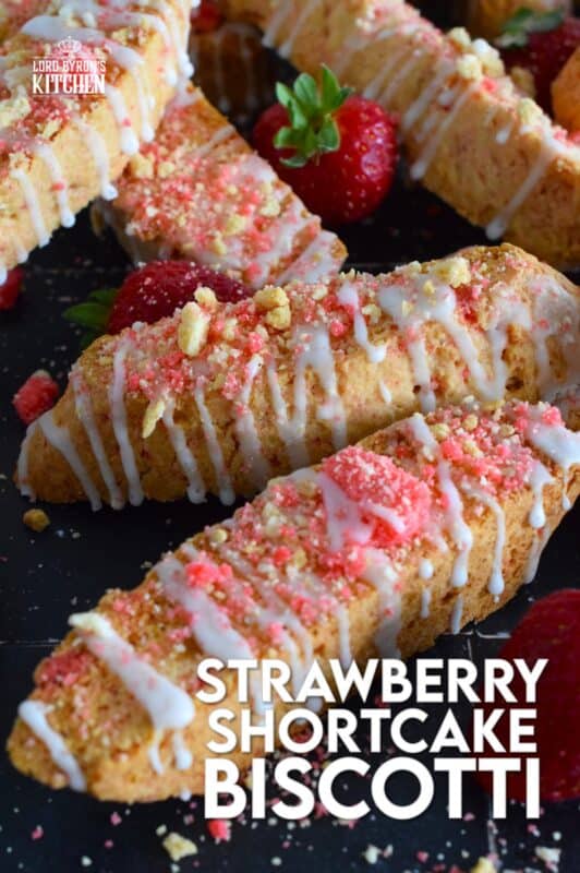 These biscotti are loaded with homemade strawberry shortcake crumbs and topped with a simple sugary glaze. Strawberry Shortcake Biscotti are light, airy, and delicious! Super easy to make, and with their cheerful inclination, no one could resist! Treat yourself to one of these with a hot tea on a lazy Sunday afternoon. #strawberry #shortcake #crumbs #cookies #biscotti #valentine