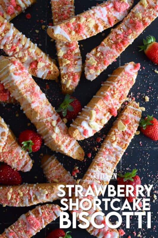 These biscotti are loaded with homemade strawberry shortcake crumbs and topped with a simple sugary glaze. Strawberry Shortcake Biscotti are light, airy, and delicious! Super easy to make, and with their cheerful inclination, no one could resist! Treat yourself to one of these with a hot tea on a lazy Sunday afternoon. #strawberry #shortcake #crumbs #cookies #biscotti #valentine